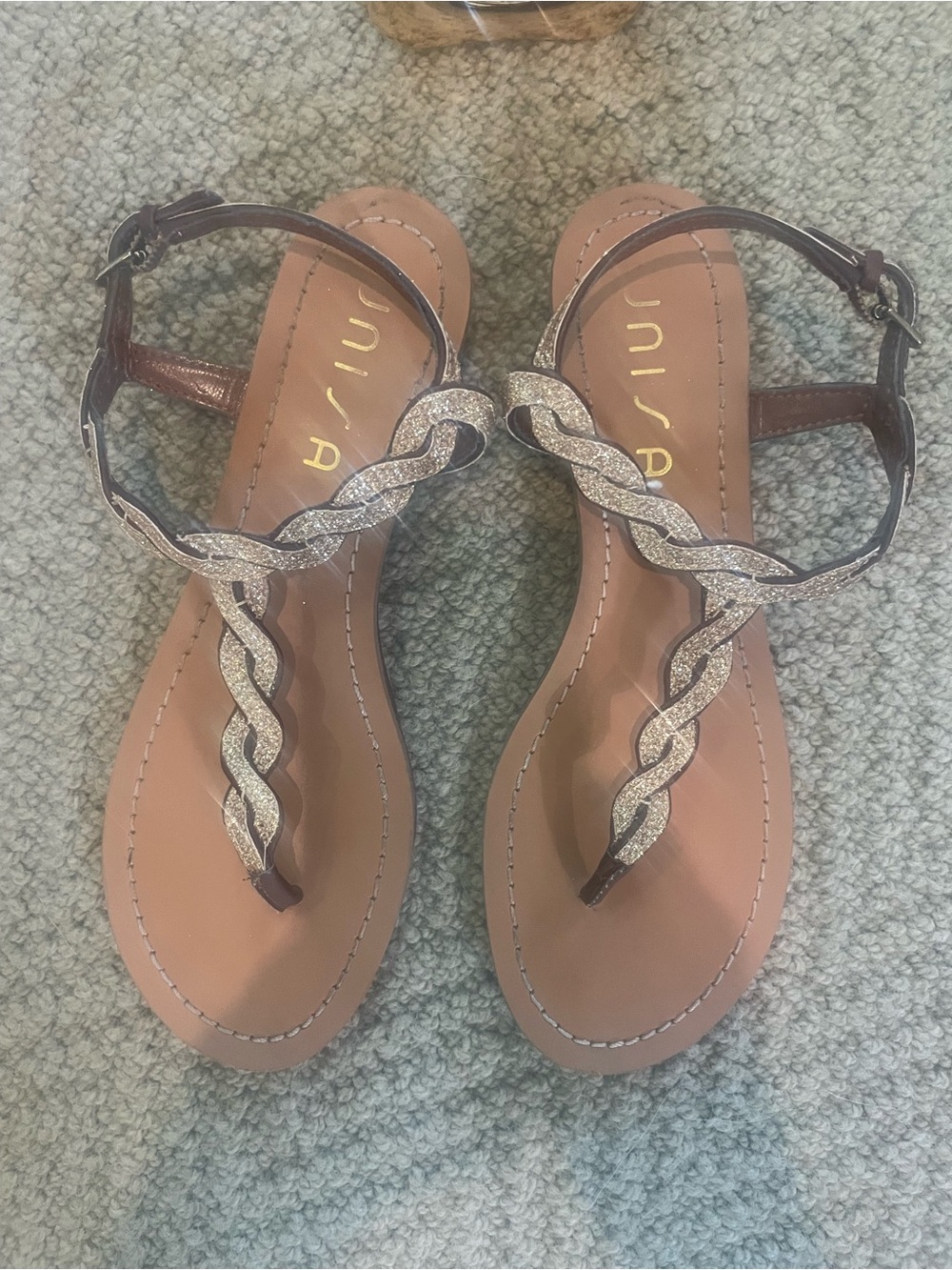 Unisa Women's Braided Glitter T-Strap Sandal in Brown and Gold